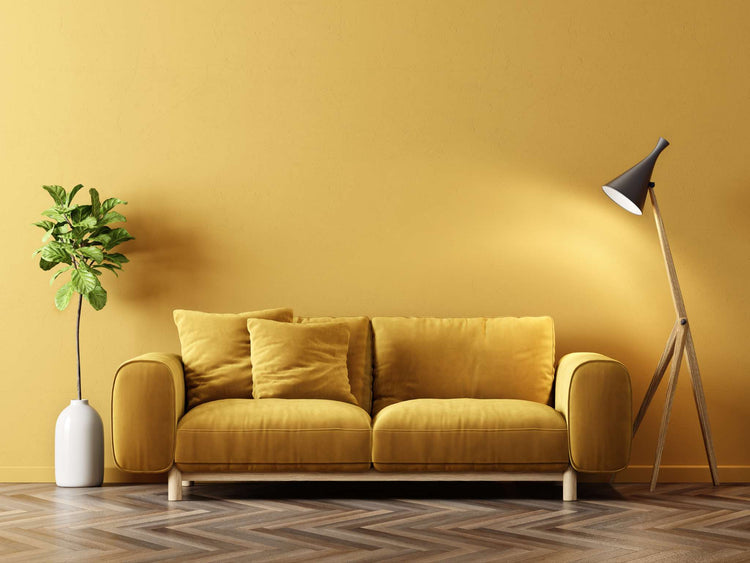 An elegant dining area in yellow wall accents.